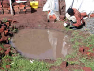 20110306-malaria cdc  burrow_pit.jpg